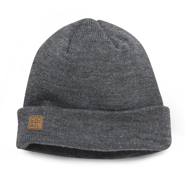 The Harbour hat by Coal is a traditional fine-knit beanie made versatile with two suede labels.